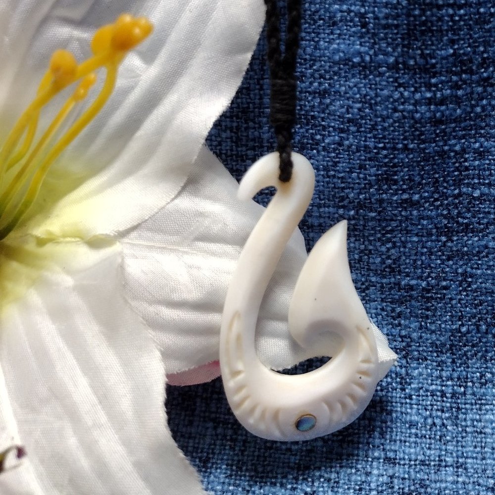 Carved Shell Pendant with Mother of Pearl inlay